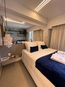 Cama ou camas em um quarto em Makia Beach by Essence - Muro Alto, Porto de Galinhas