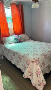 Кровать или кровати в номере La Cabaña Punta Negra