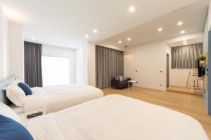 A bed or beds in a room at 靜巷19號