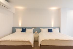 A bed or beds in a room at 靜巷19號