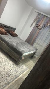 Postel nebo postele na pokoji v ubytování Субаренда