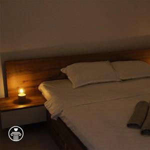 Katil atau katil-katil dalam bilik di Eros Apartments
