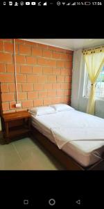Postel nebo postele na pokoji v ubytování HOTEL RM