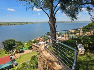 a view of a body of water from a house at Eagles View Kungwini in Erasmus