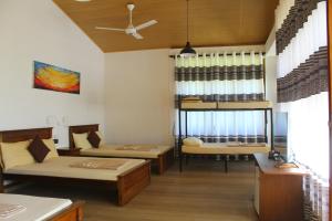 Postel nebo postele na pokoji v ubytování Triniton Holiday Villas