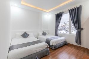 Postel nebo postele na pokoji v ubytování Cara Hostel & Spa