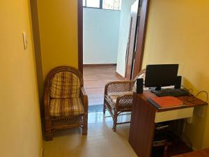 TV a/nebo společenská místnost v ubytování Hotel O U.G. Grand