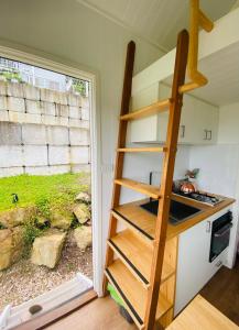 Kuchyň nebo kuchyňský kout v ubytování Tiny Nest
