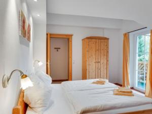 Posteľ alebo postele v izbe v ubytovaní Apartment in Grossarl near Ski Slopes