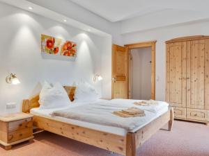 Posteľ alebo postele v izbe v ubytovaní Apartment in Grossarl near Ski Slopes