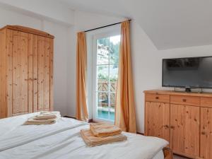 Posteľ alebo postele v izbe v ubytovaní Apartment in Grossarl near Ski Slopes