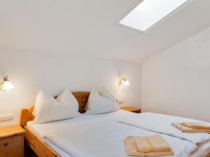 Posteľ alebo postele v izbe v ubytovaní Apartment in Grossarl near Ski Slopes
