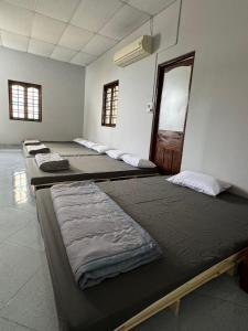 Кровать или кровати в номере Sun Moon - Home 4