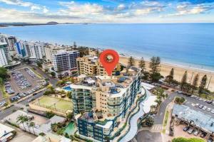 an aerial view of a building with a red circle on top at Landmark Resort Mooloolaba 4th Floor Apartment with a View in Mooloolaba