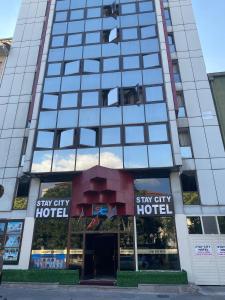 a building with a sign that reads stay city hotel at STAYCITY OTEL in Altındağ