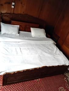 Ένα ή περισσότερα κρεβάτια σε δωμάτιο στο Guna guest house