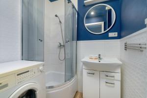 Kúpeľňa v ubytovaní Family Apartments Osiedle Rusa by Renters