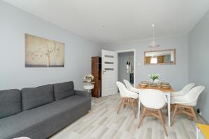 Posedenie v ubytovaní Family Apartments Osiedle Rusa by Noclegi Renters