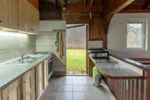 eine Küche mit einer Spüle und einer Arbeitsplatte in der Unterkunft Holiday Home Lanita with Two Bedrooms & Terrace 