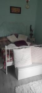 A bed or beds in a room at Casa M-MiMi"s Paradise