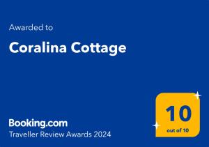 En logo, et sertifikat eller et firmaskilt på Coralina Cottage