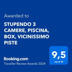 a blue sign with the words awarded to stepandro cambridge pis at STUPENDO 3 CAMERE, PISCINA, BOX, VICINISSIMO PISTE in Prato Nevoso