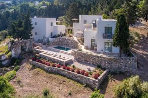 an aerial view of a house on a hill at AnamneZia Luxury Suites in Kos Town