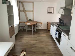 Kuchyň nebo kuchyňský kout v ubytování Gemütliche Kleine Wohnung