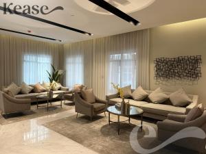 a living room with couches and chairs and tables at Kease Hittin N-12 Lusso Hejaz Balcony GZ83 in Riyadh