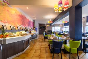 Restaurace v ubytování BRIT HOTEL Confort CAMBRAI