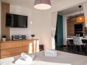 Kuchyňa alebo kuchynka v ubytovaní Apartamenty Zakątek Harenda