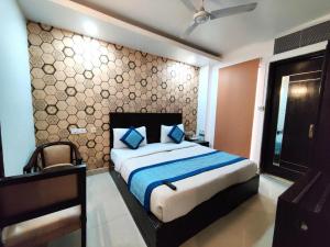 Postel nebo postele na pokoji v ubytování Hotel Delhi Pride, Karol Bagh