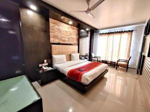 Postel nebo postele na pokoji v ubytování Hotel Delhi Pride, Karol Bagh