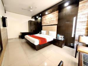 Postel nebo postele na pokoji v ubytování Hotel Delhi Pride, Karol Bagh