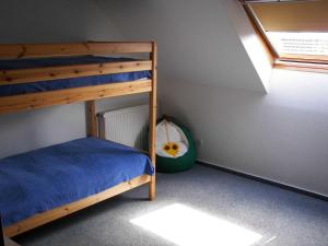 Katil atau katil-katil dalam bilik di Ferienhaus Erholungsnest