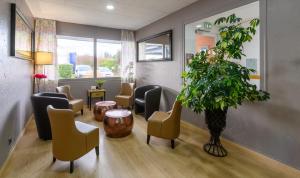 Posezení v ubytování BRIT HOTEL Confort CAMBRAI