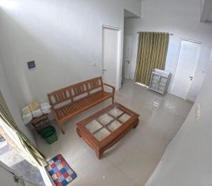 an overhead view of a room with a bed and a table at GKR J8 Homestay Jogja in Pedes