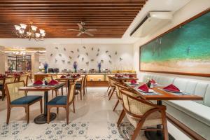 Restoran või mõni muu söögikoht majutusasutuses Amina Lantana Hoi An Hotel & Spa
