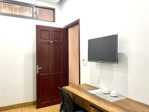 TV a/nebo společenská místnost v ubytování Golden Field Villa Hoi An