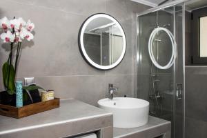 A bathroom at Christina Apartment