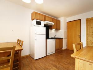 Kuchnia lub aneks kuchenny w obiekcie A315- Appartement 3 pieces 6 personnes
