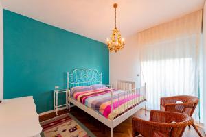 Кровать или кровати в номере San Silvestro - Bright Home with Private Parking!