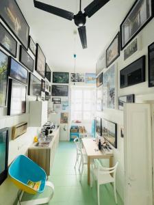 a kitchen with a table and chairs in a room at 1881 Artistic Royal House in Caserta