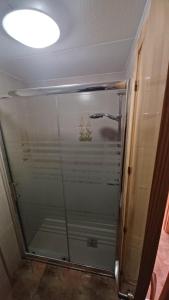 a shower with a glass door in a bathroom at Peñiscola Playa Vista Mar Superior Orangecosta in Peñíscola +19 photos