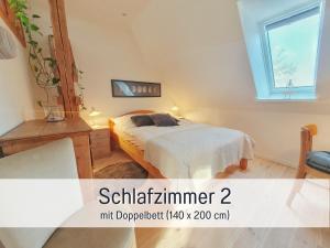 Postel nebo postele na pokoji v ubytování Ferienloft Sternenblick - strandnah, haustierfreundlich, tolle Küche, optimal für Workation, 4 Personen + 48 fotografií