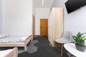 Postel nebo postele na pokoji v ubytování Moon Hostel Warszawa