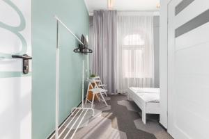 Postel nebo postele na pokoji v ubytování Moon Hostel Warszawa