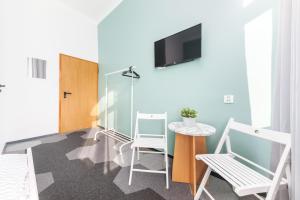 TV a/nebo společenská místnost v ubytování Moon Hostel Warszawa