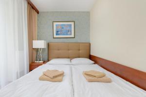 Posteľ alebo postele v izbe v ubytovaní Gryf Resort Międzywodzie