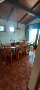 a dining room with a wooden table and chairs at Villa Maison de campagne 04 Vacheres Luberon 3 chambres 8 personnes in Vachères